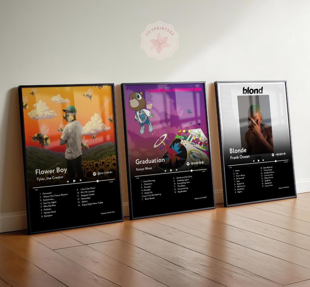 Three Melodia album posters leaning against a wall